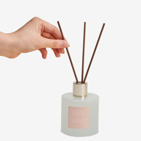 COCORRÍNA bottle with cotton sticks allows aroma adjustment by adding or removing sticks.