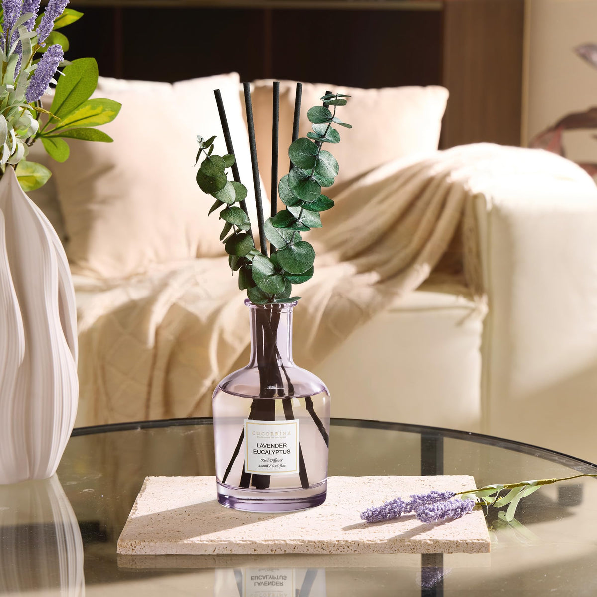 COCORRÍNA diffuser in a cozy bedroom setup for relaxation