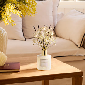 COCORRINA Gardenia glass diffuser shown on a table for home scent