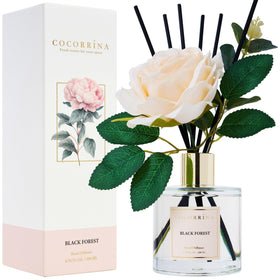 COCORRÍNA Black Forest diffuser bottle releasing warm vanilla and cedar notes.