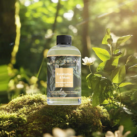 Cocorrina reed diffuser bottle angled for easy spill-proof refill.