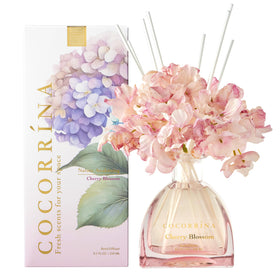 COCORRÍNA Cherry Blossom diffuser bottle delivers long-lasting ambiance for living rooms.