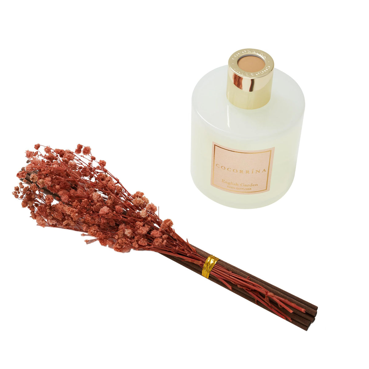 COCORRÍNA reed sticks and bottle on a bathroom shelf for aroma