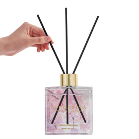 COCORRÍNA home setup featuring diffuser on a shelf for inviting fragrance