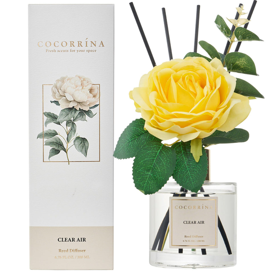 COCORRÍNA reed diffuser set bottle with hand-placed botanicals for a lasting floral aroma