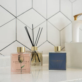 COCORRÍNA sandalwood rose diffuser bottle delivering a calming, spa-like ambience.