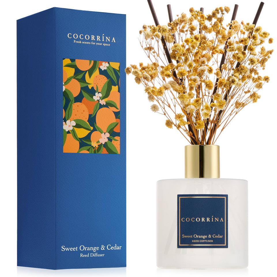 COCORRÍNA Reed Diffuser bottle showing Sweet Orange Cedar scent for a welcoming room aroma.