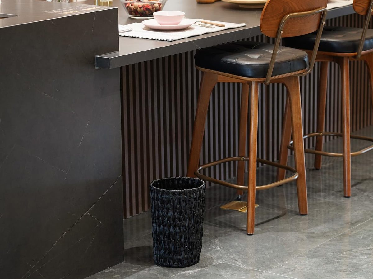 Coeusy handwoven round wicker basket with waterproof surface for bathroom use.