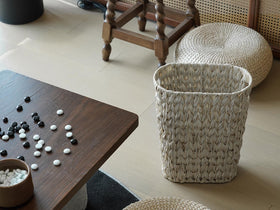 Coeusy versatile storage basket doubles as waste bin and organizer.