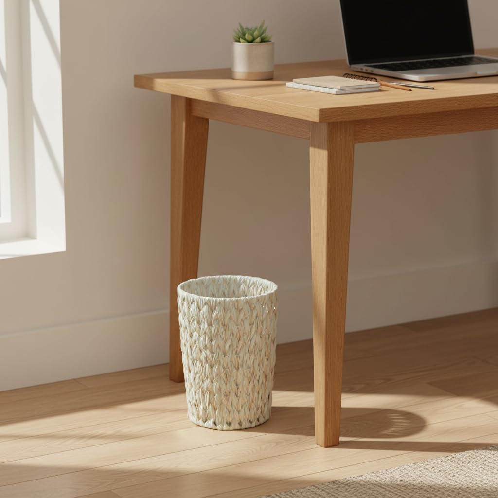Coeusy waterproof wicker trash basket cleans easily and resists moisture.