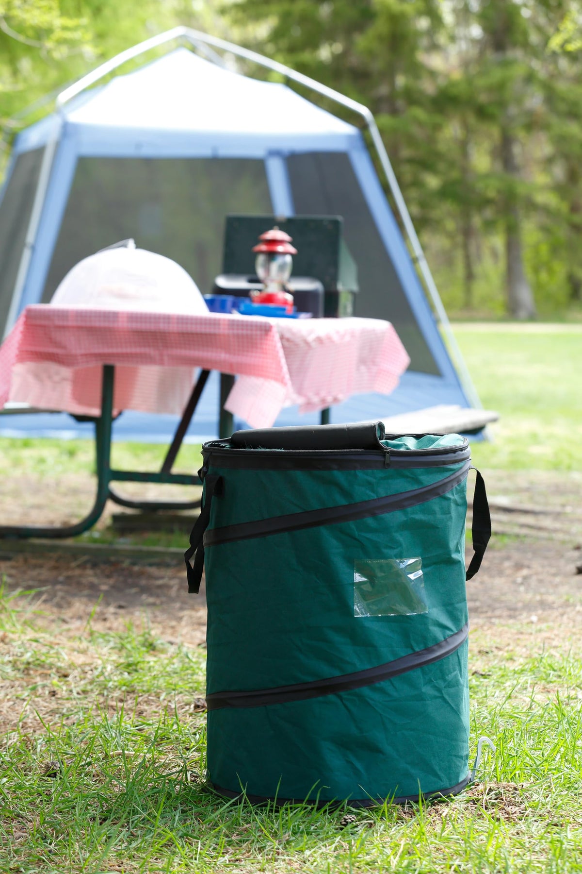 Coghlan's Pop-Up Trash Bin at campsite demonstrates a tidy, organized cleanup