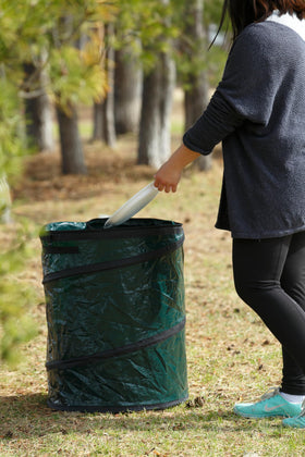 Coghlan's Pop-Up Trash Bin with zippered lid helps contain odors and deter insects