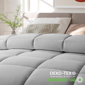 COHOME queen comforter laid on bed showing inviting setup and neutral color.