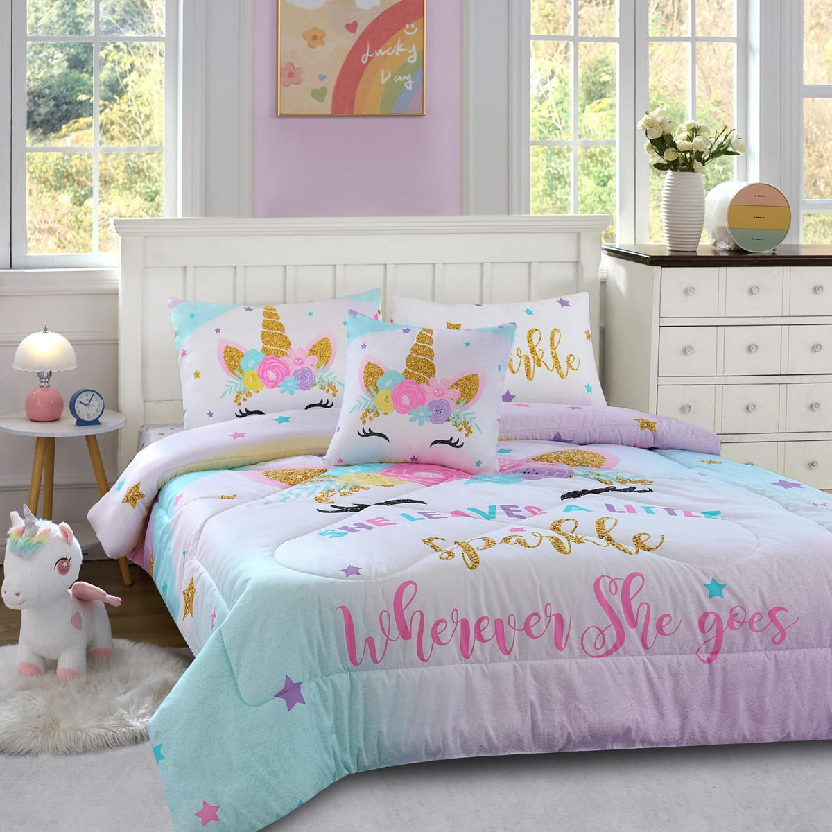 Cokouchyi pink and rainbow bedding enhances a bright, imaginative space for kids.