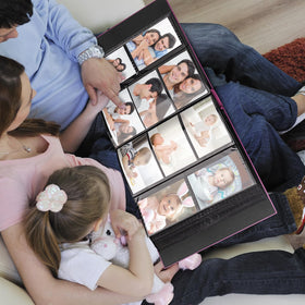 Colemoly photo album rests on a coffee table inviting guests to reminisce.