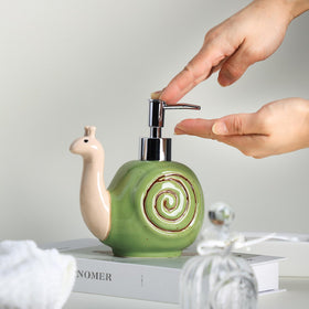 Colias Wing ceramic dispenser holds up to 14 oz of liquid soap or shower gel