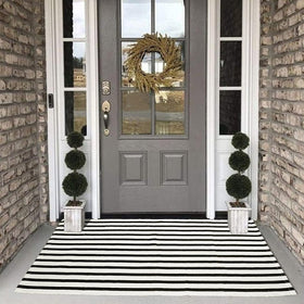 Versatile Collive rug suitable for porch, kitchen, and welcoming hallway.