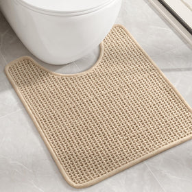 Color&Geometry chenille toilet rug absorbs spills for a dry bathroom floor.