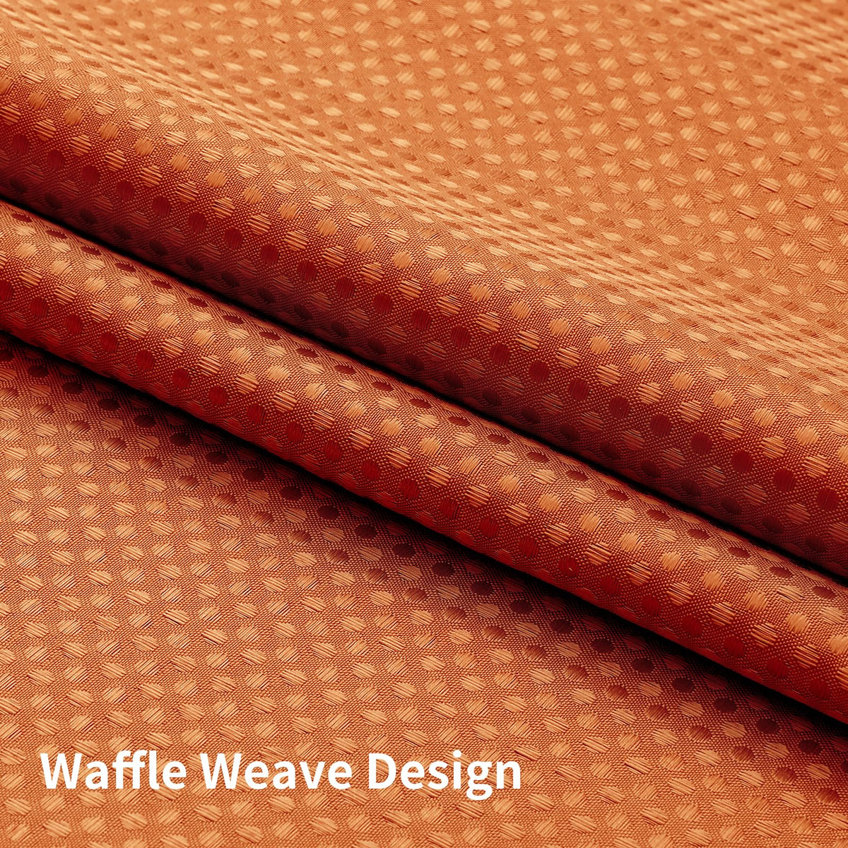 Colorful Star burnt orange curtain brings warm, hotel-inspired ambiance.