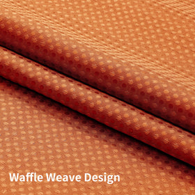 Colorful Star burnt orange curtain brings warm, hotel-inspired ambiance.