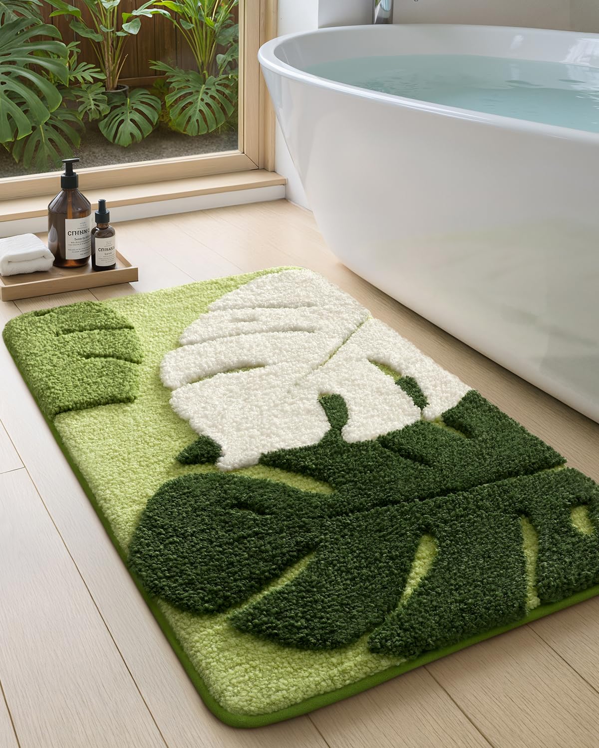 Color&Geometry cute leaf bathroom rug with soft pile for a cozy morning routine.