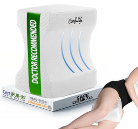 ComfiLife knee pillow between knees supports alignment and lowers back pressure.