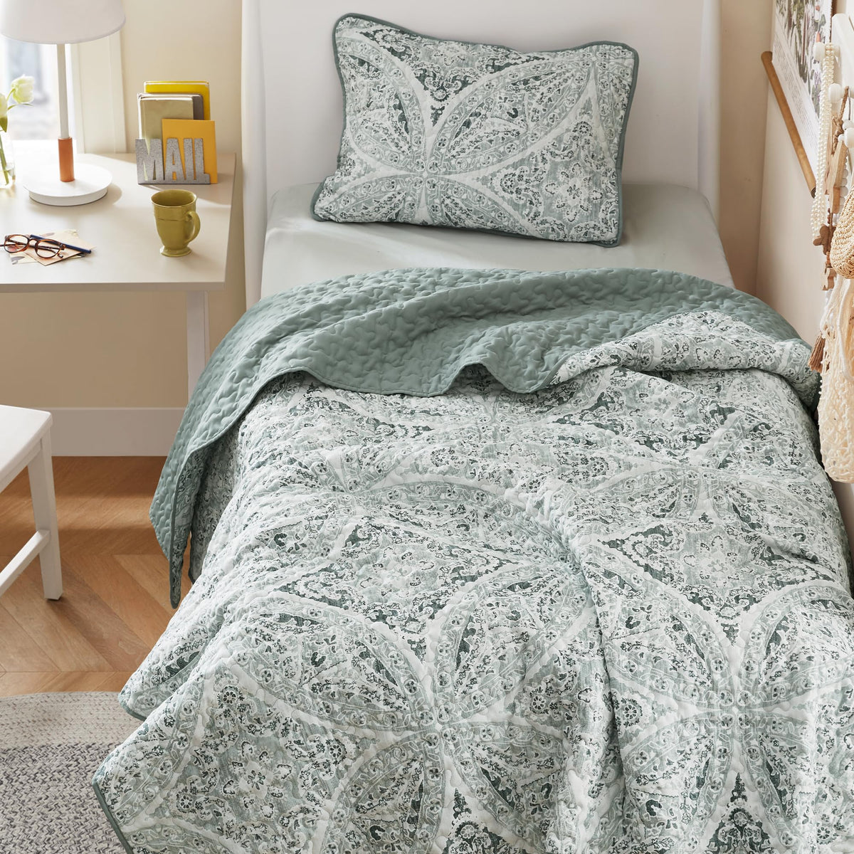 Comfort Spaces boho quilt medallion stitching detail adds cozy ambience.