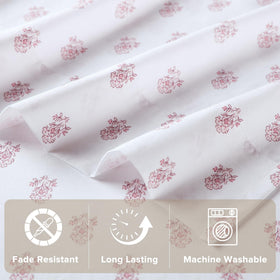 Bedroom styled with Comfort Spaces floral pink sheets and coordinating decor