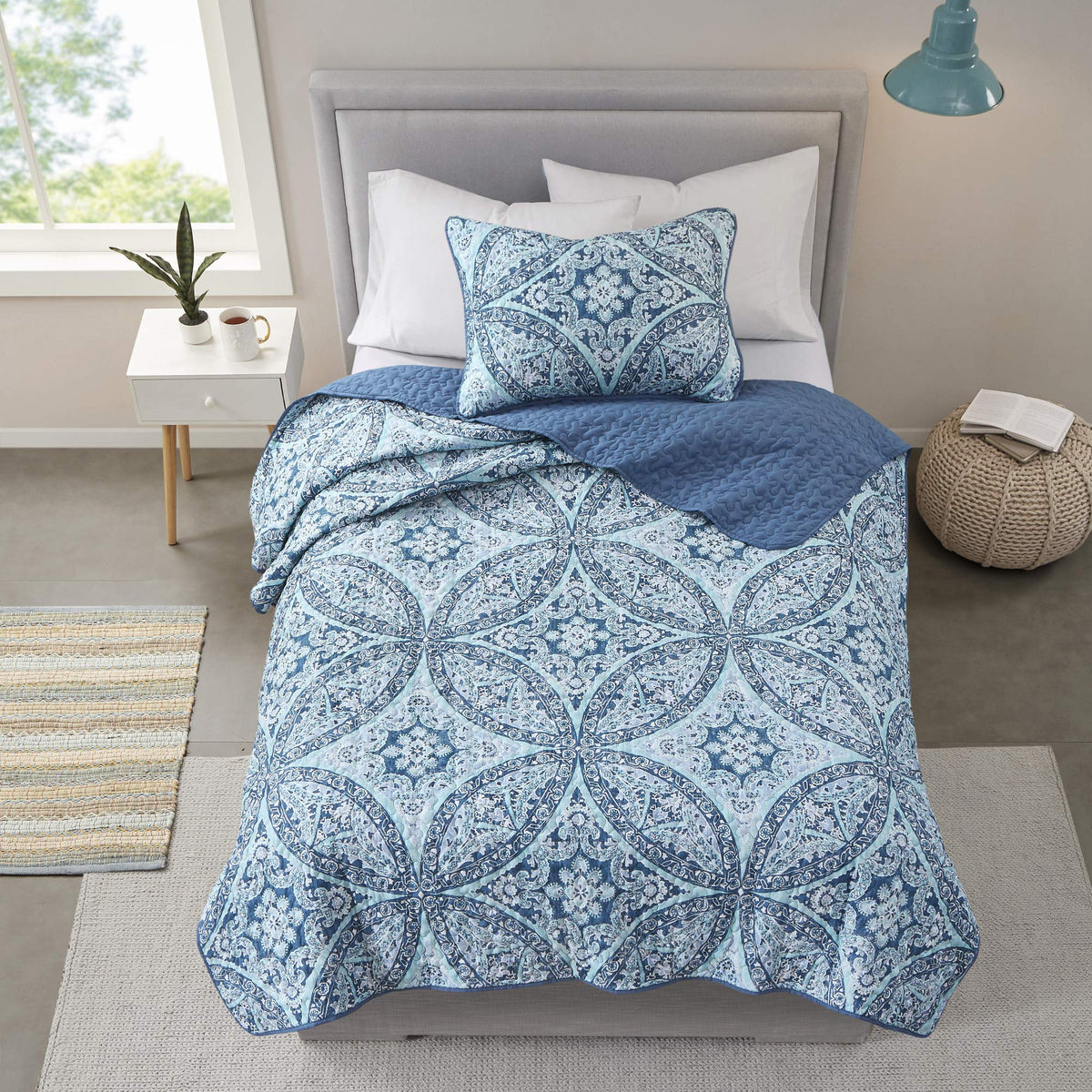 Gloria aqua damask sham adds coordinated elegance and soft texture.