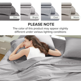 Comfort Spaces grey twin bed with sheet set ready for quick makeover