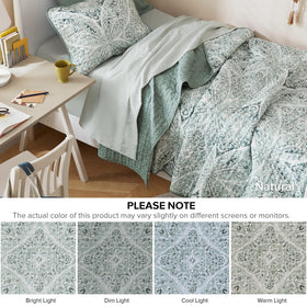 Comfort Spaces reversible coverlet demonstrates versatile year-round layering.