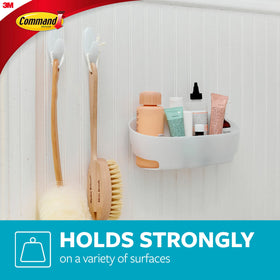 Command bath set toothbrush holder keeps daily essentials off the counter.