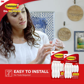 Command Designer Hooks holding up to 3 lbs on smooth surfaces.