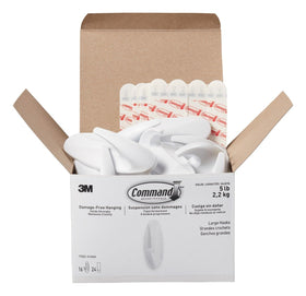 Command Large Designer Hooks mounted on a wall for durable organization.