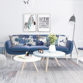 COMMINY blue-grey daisy-pattern pillow cover on sofa for versatile decor.