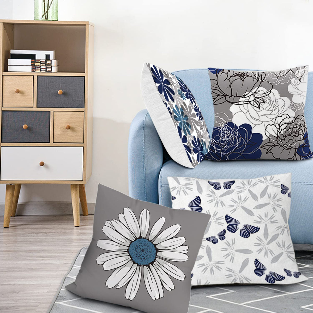 COMMINY farmhouse-modern aesthetic pillow cover adds color and texture.