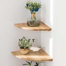 Conamily solid oak corner shelf with round end wall mount displaying a plant