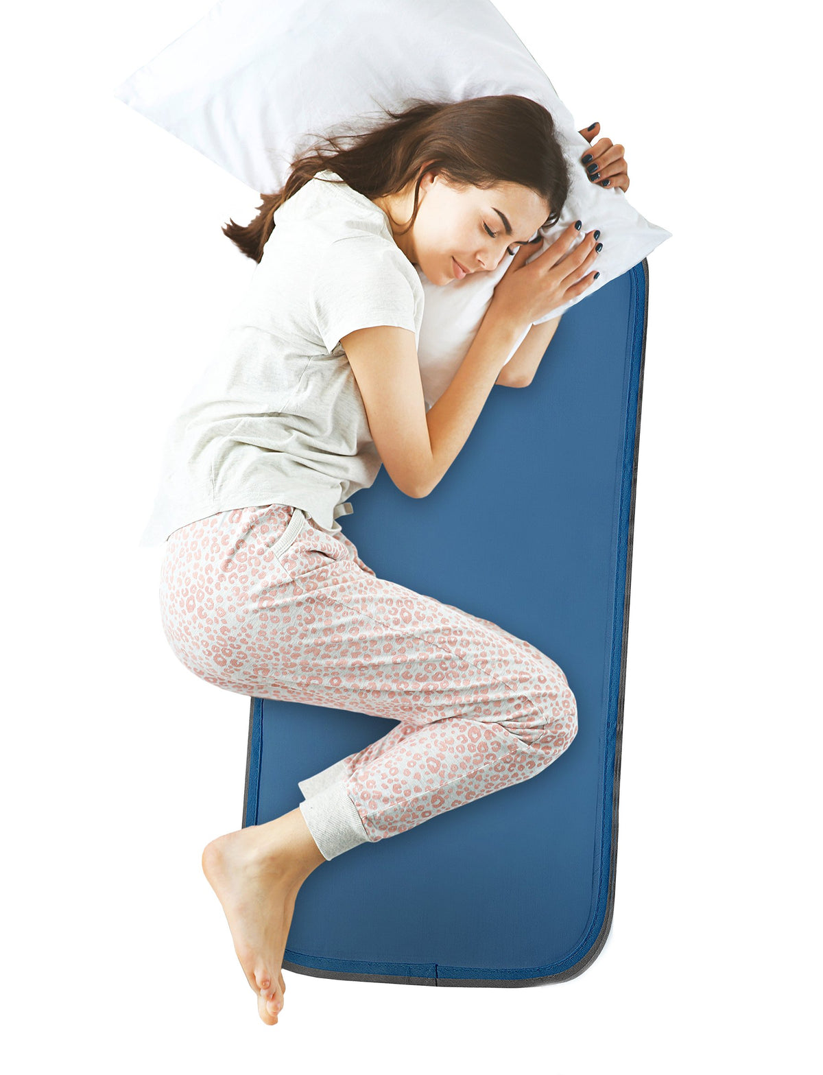 Cool Care Technologies cooling pad on a bed providing instant cooling relief.