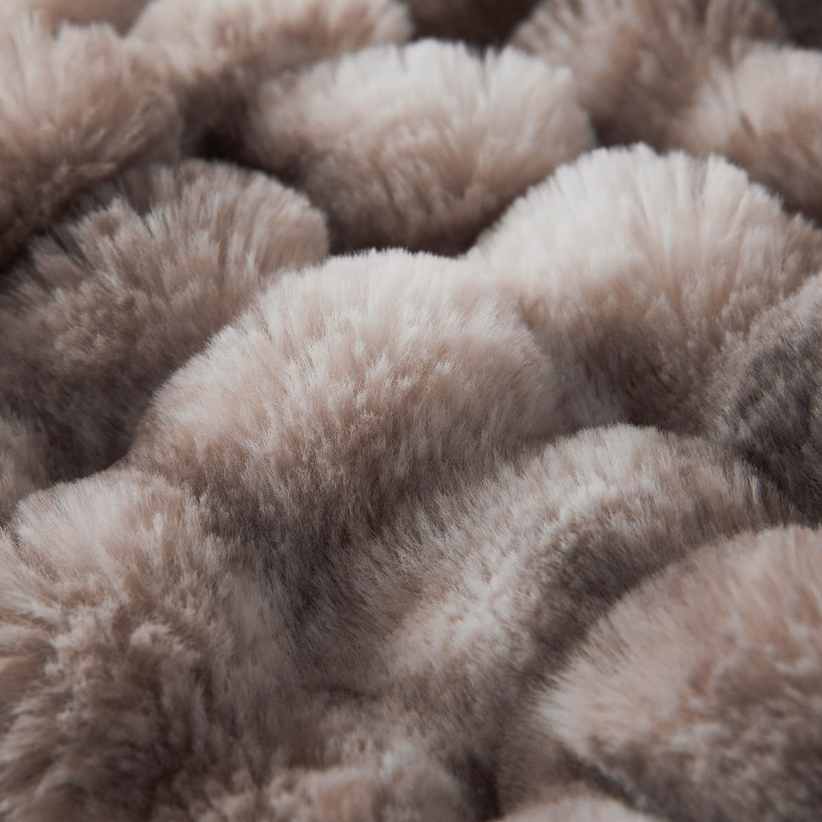 COOVA tie-dye brown throw adds style and easy care warmth.