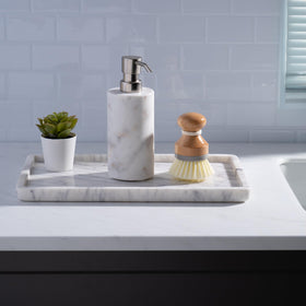 Cork & Mill marble tray organizing oil bottles on a kitchen counter.