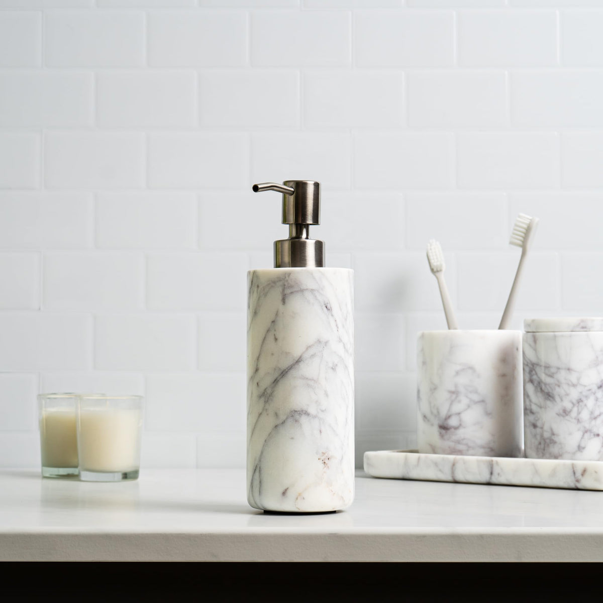 Cork & Mill marble dispenser with 8 oz capacity.