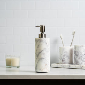 Cork & Mill marble dispenser with 8 oz capacity.