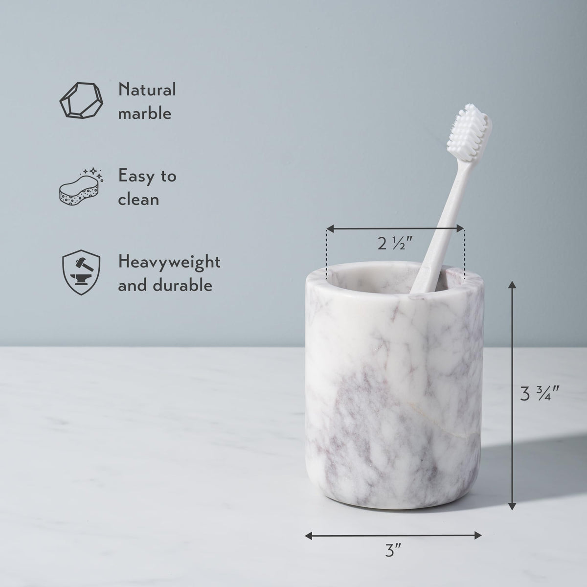 Cork & Mill toothbrush holder side view highlights stable, heavyweight marble.