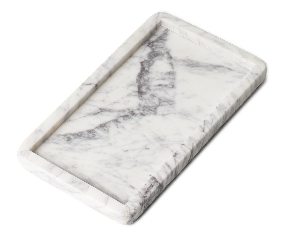 Cork & Mill marble tray on bathroom counter highlights unique veining for elegant organization.