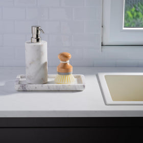 Cork & Mill small marble jewelry tray stores rings and bracelets neatly.