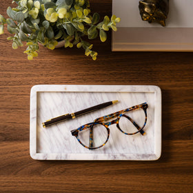 Cork & Mill marble tray on toilet tank adds refined touch.