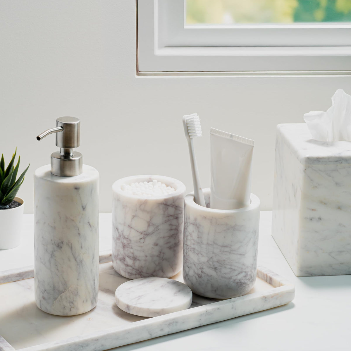 Cork & Mill marble tumbler with pens shows durable countertop organization.