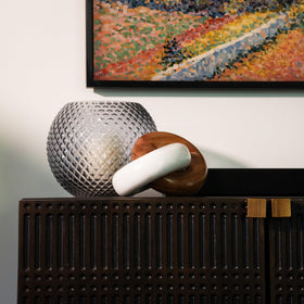 Cork & Mill knot sculpture on a mantel adds refined texture to living spaces