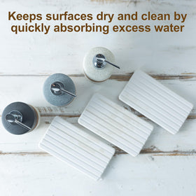Cormomu two dispensers on a gray countertop, versatile for soap types