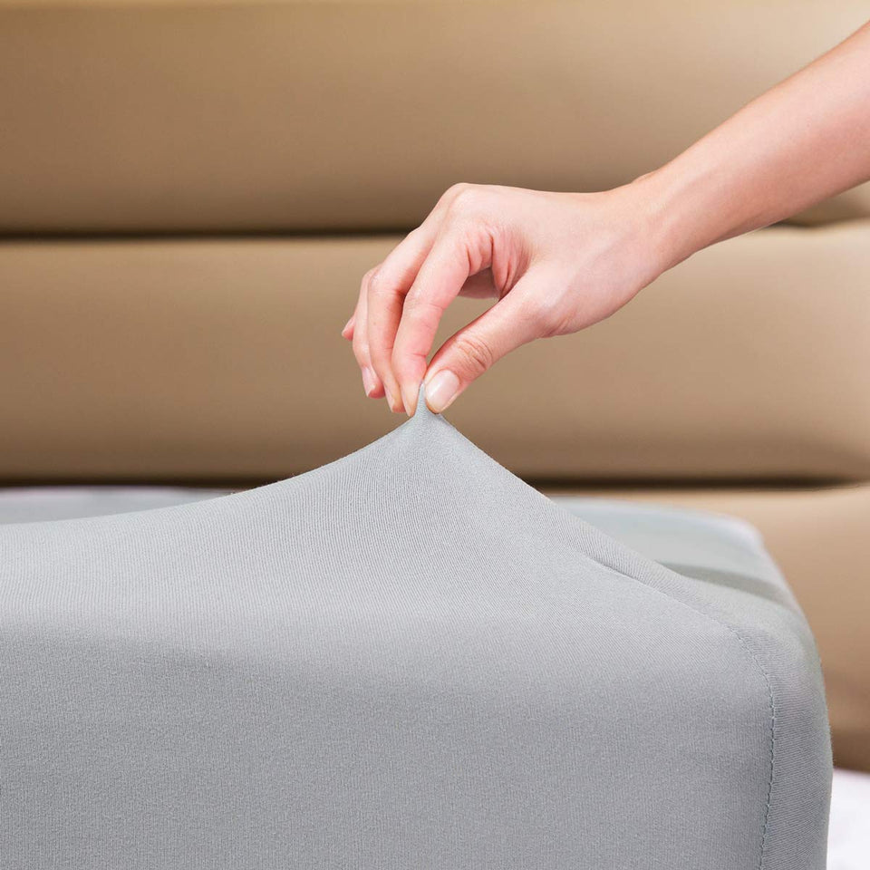 COSMOPLUS King fitted sheet with snug-fit design anchors securely on a king mattress.